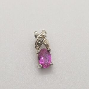 pink oval cut stone pendant sterling silver with diamond chip